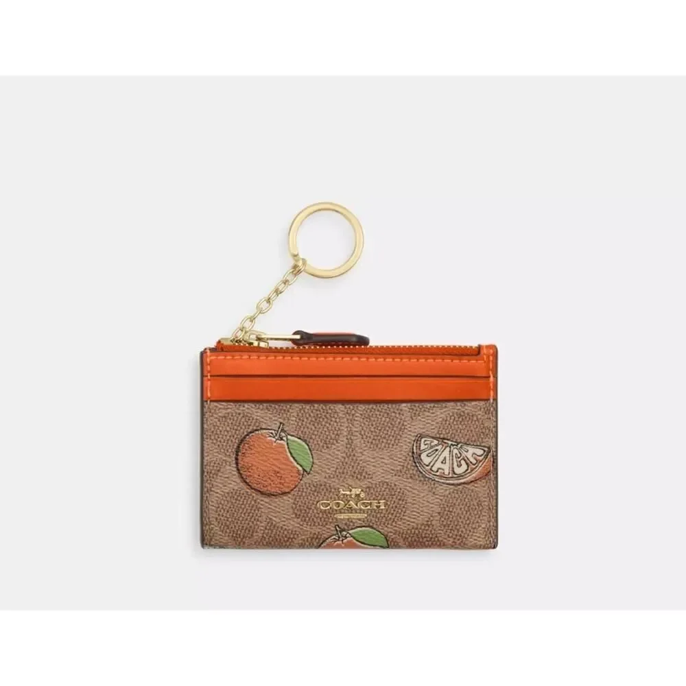 NWT Coach CAR21 Mini Skinny Id Case In Signature Canvas With Orange Print In Tan